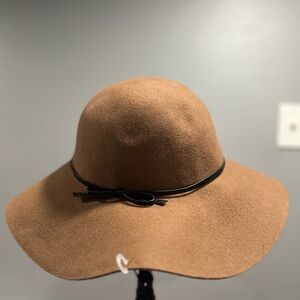 Elegant Tan Women's Hat with Black Trim